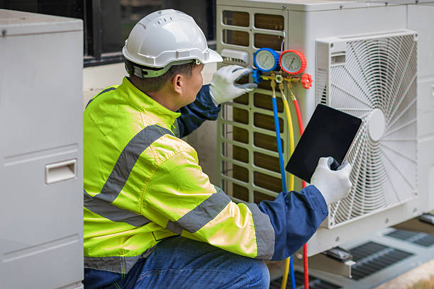 Professional Emergency Ac Repair technician working in Fredericksburg, IN